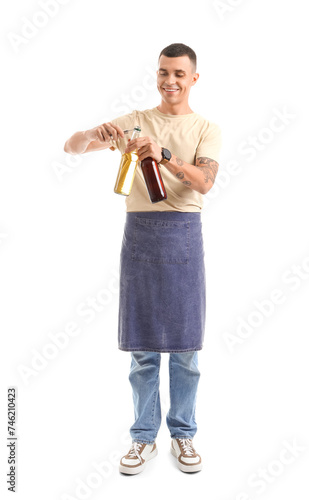 Young male bartender with b...