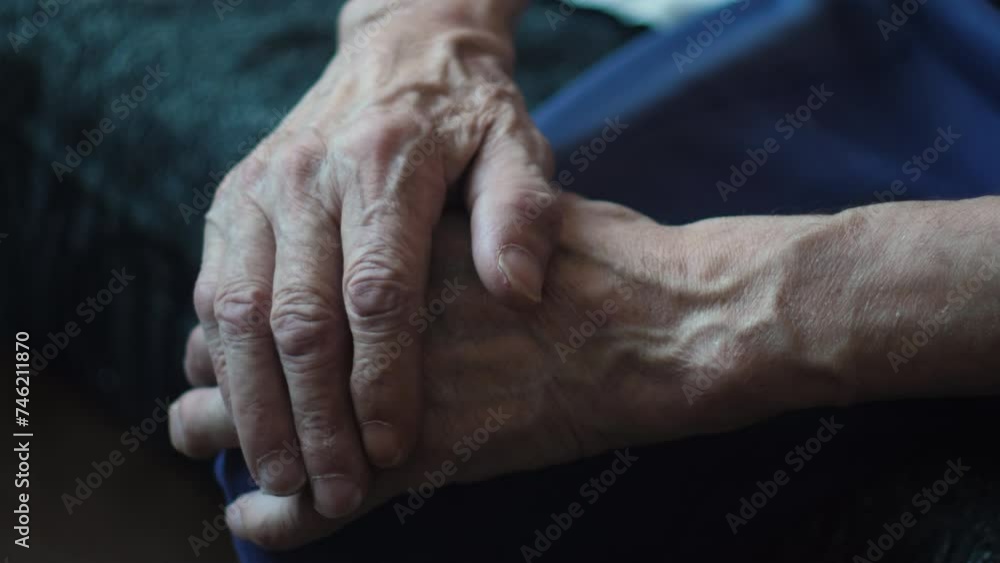 Old age in details, Wrinkled hands of an old man close-up. Symbols of experience: Worn hands as chronicles of life Old age in details, Wrinkled hands of an old man close-up. Symbols of experience: Worn hands as chronicles of life