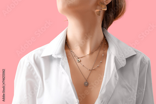 Woman with silver necklace ...