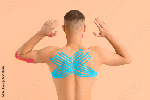 Young man with physio tape ...