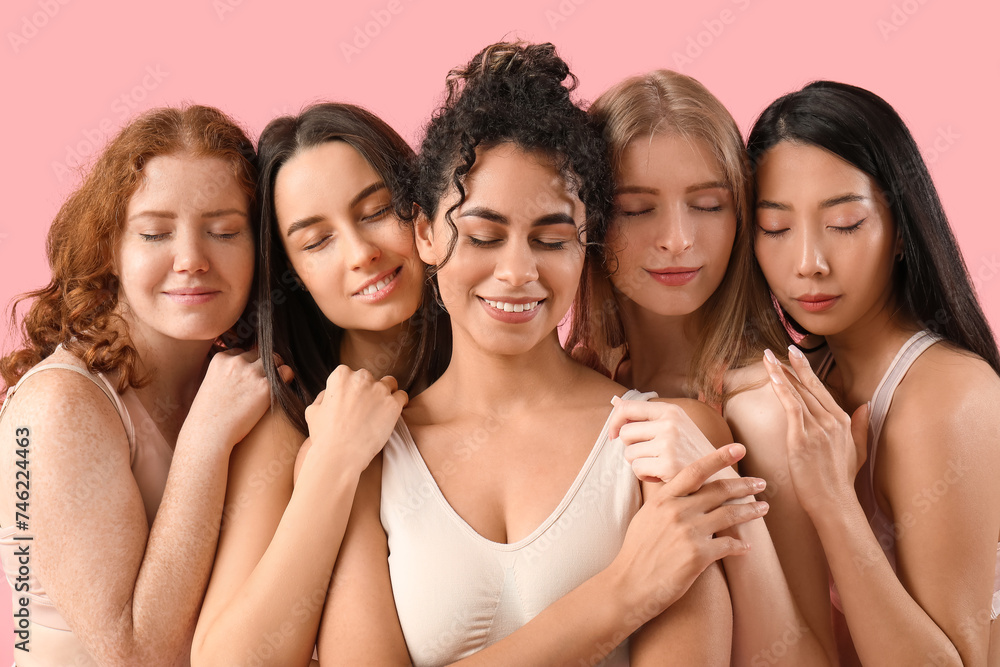 Beautiful young happy women on pink background. Women history month Beautiful young happy women on pink background. Women history month