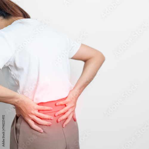 Wallpaper Mural adult female with muscle pain on gray background. Elderly woman having back body ache due to Piriformis Syndrome, Low Back Pain and Spinal Compression. Office syndrome and medical concept Torontodigital.ca