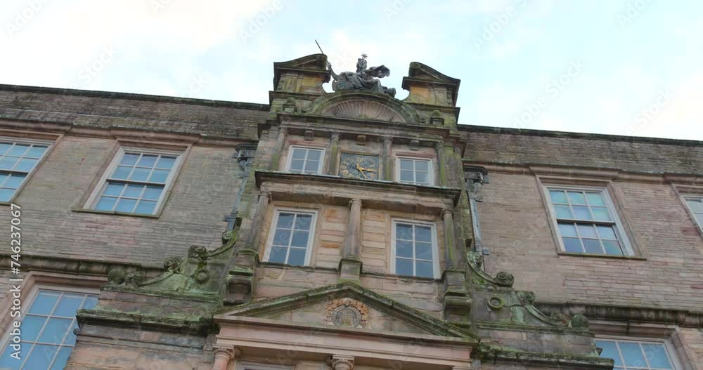 Looking Up At North Front Of Mansion House At Lyme Park In Cheshire, England. low angle shot Looking Up At North Front Of Mansion House At Lyme Park In Cheshire, England. low angle shot