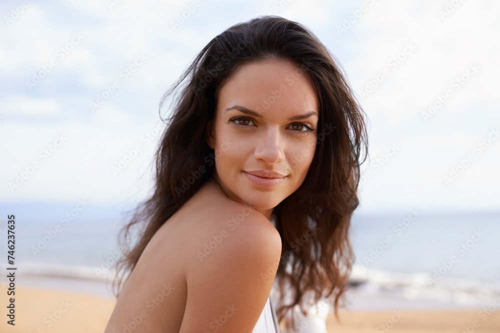 Beach, sea and portrait of woman on tropical vacation, adventure or holiday for travel. Happy, nature and young female person with positive attitude by ocean on summer weekend trip by island. Beach, sea and portrait of woman on tropical vacation, adventure or holiday for travel. Happy, nature and young female person with positive attitude by ocean on summer weekend trip by island.