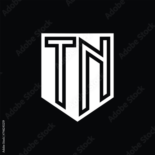 TN Letter Logo monogram shield geometric line inside shield design template