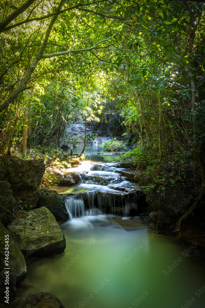 Deep forest waterfalls at Erawan water falls national park, in Thailand Deep forest waterfalls at Erawan water falls national park, in Thailand