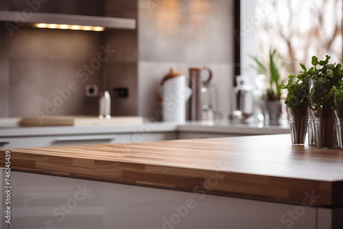 Empty Wooden Kitchen Counter with Blurred Modern Kitchen Background. Interior Design Concept