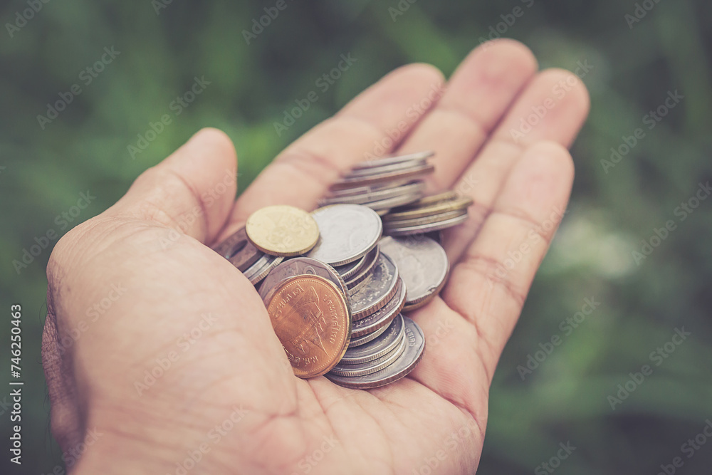 Close up coin in hand Close up coin in hand