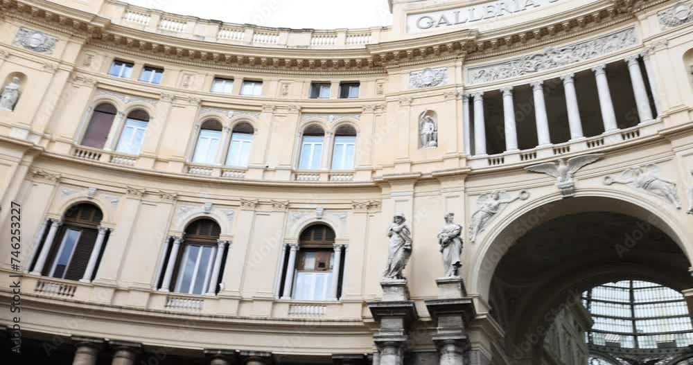 Panorama of architecture of Galleria Umberto I in European style with beautiful columns and balconies Panorama of architecture of Galleria Umberto I in European style with beautiful columns and balconies