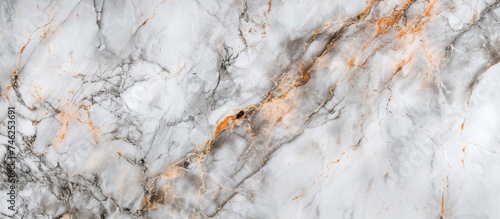 A captivating display of a beautiful marble surface texture featuring prominent orange streaks.