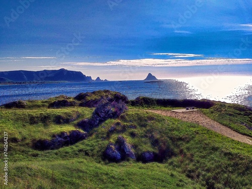 Sea and mounten in the sunset photo