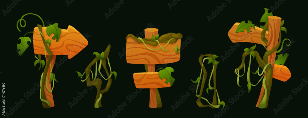 Obraz premium Wooden signboards with creeping liana vines and green leaves. Cartoon game ui assets vector set of wood signage board and arrow pointer with hanging jungle plant rope and tropical tree branches.