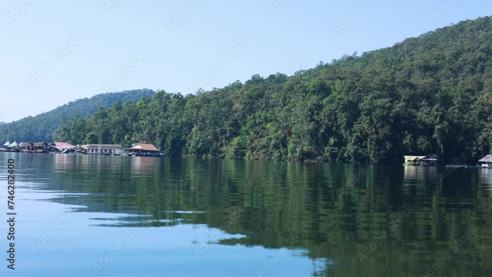 Serene Lake with Floating Houses Serene Lake with Floating Houses