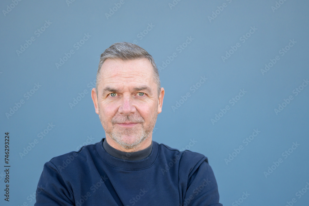 Obraz premium Close up portrait of a middle aged man looking doubtfully or scared
