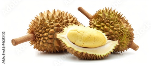 Close-up photo of a fresh and organic dupa fruit against a clean white background photo