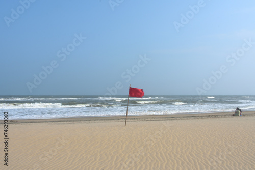 Red flag on the beach denotes that area is in danger.
