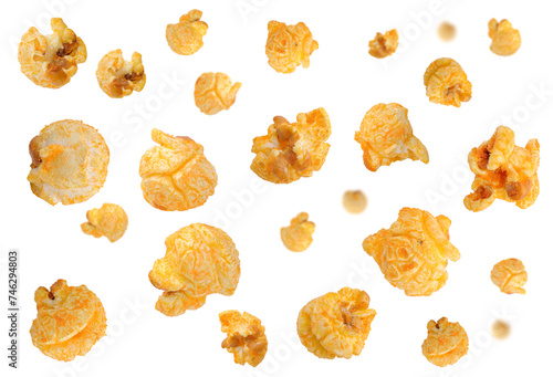 Falling Delicious cheese popcorn isolated on white background. Popcorn with cheddar cheese flakes fall.