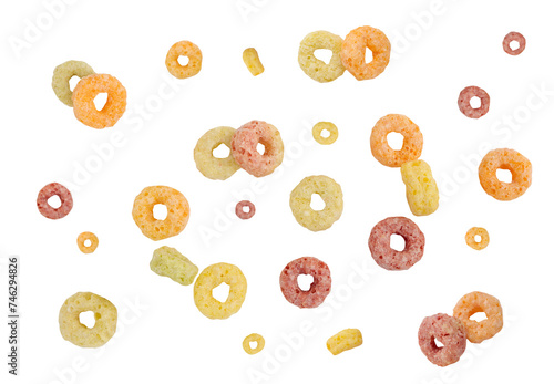 Falling colorful corn rings isolated on white background with clipping path. photo