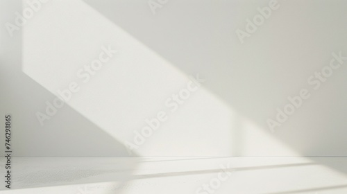 Empty Room with Sunlight Casting Geometric Shadows. An empty room is illuminated by natural sunlight, casting geometric shadows on a plain white wall, creating a tranquil atmosphere.