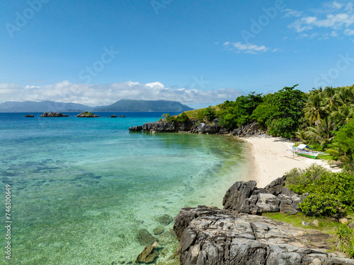 Tropical landscape of white beach in Cobrador Island. Romblon, Philippines.