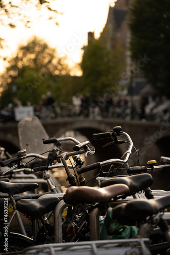 Details of bicycles in the canals of Amsterdam, Netherlands.