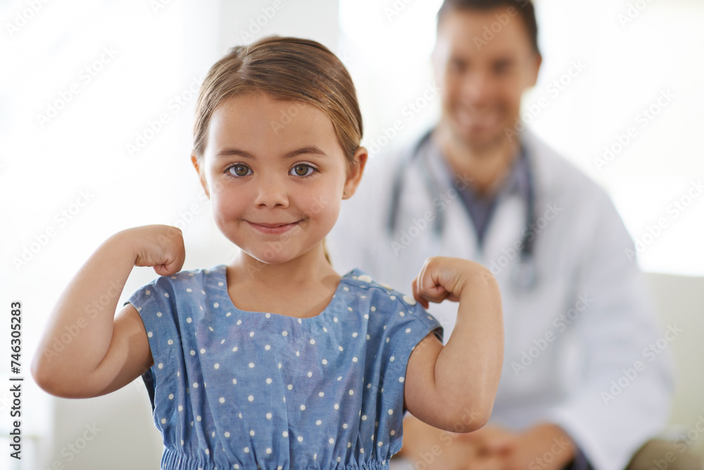 Pediatrician, young girl and arm with flex for strong, brave and happiness for treatment. Doctor, smile and child at clinic with success for test results, consultation and healthy immune system Pediatrician, young girl and arm with flex for strong, brave and happiness for treatment. Doctor, smile and child at clinic with success for test results, consultation and healthy immune system