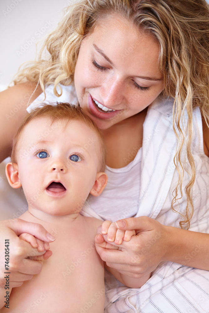 Happy mother, baby and love with care, trust or bonding together on holiday or weekend at home. Face of mom and little toddler with smile for family, childhood or motherhood in relax at the house Happy mother, baby and love with care, trust or bonding together on holiday or weekend at home. Face of mom and little toddler with smile for family, childhood or motherhood in relax at the house