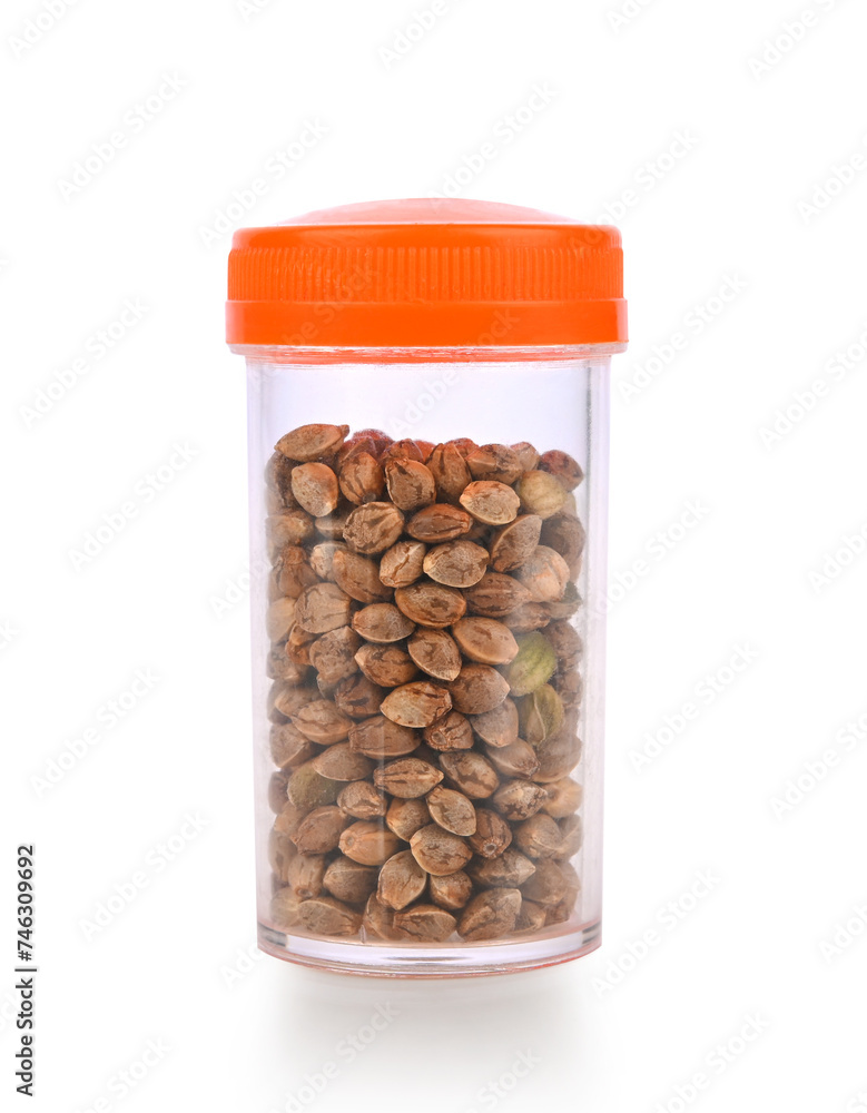 Cannabis seeds in Clear Plastic Jar isolated Cannabis seeds in Clear Plastic Jar isolated