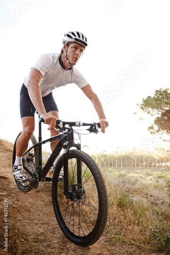 Man, bike and forest for nature, off road and cycling for health and wellness. Athlete, bicycle and training for workout, transportation and exercise with cape town mountain trail for fitness