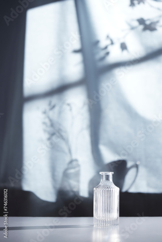Background with shadows shining through a window with sunlight streaming in.