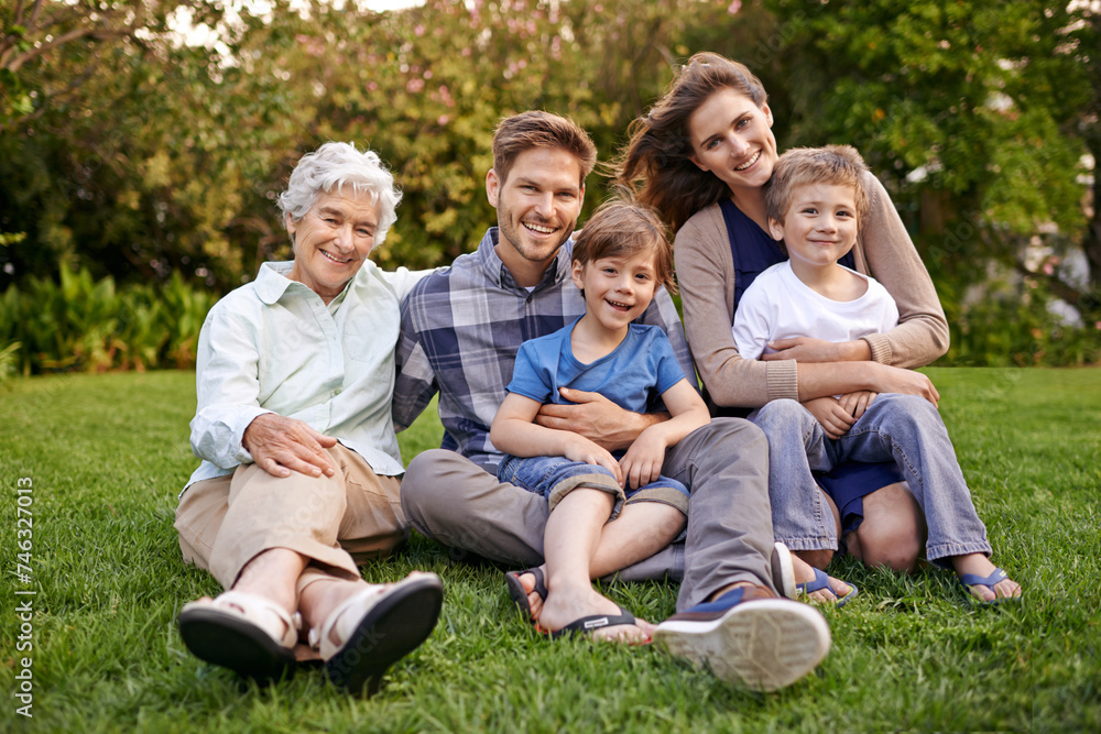 Nature, portrait and children with parents and grandmother relaxing on grass in outdoor park or garden. Smile, family and boy kids on lawn with mom, dad and grandma for bonding in field together. Nature, portrait and children with parents and grandmother relaxing on grass in outdoor park or garden. Smile, family and boy kids on lawn with mom, dad and grandma for bonding in field together.