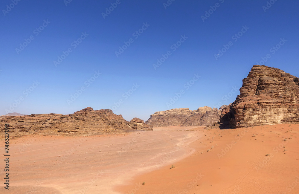 the fascinating arid and desert landscape of Wadi Rum. Wadi Rum desert in Jordan, Wadi Rum is one of the most visited tourist sites in the world. the fascinating arid and desert landscape of Wadi Rum. Wadi Rum desert in Jordan, Wadi Rum is one of the most visited tourist sites in the world.