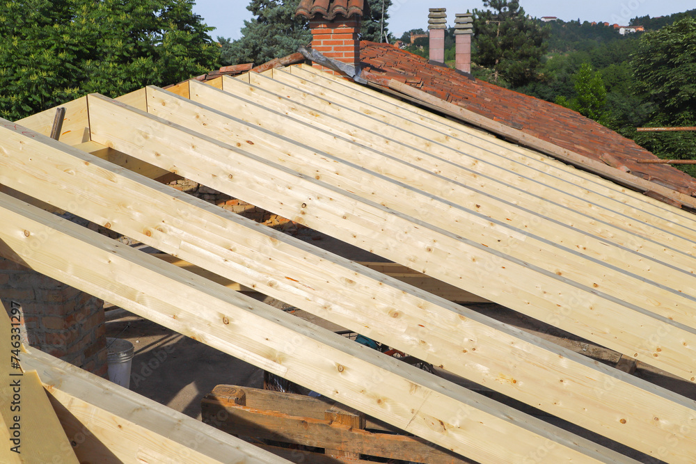 construction site - renovation of a roof - wooden beams construction site - renovation of a roof - wooden beams