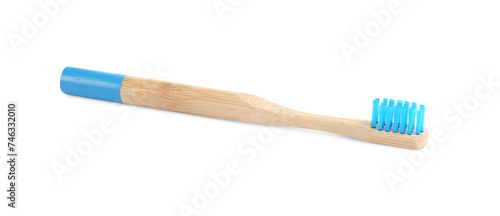 Bamboo toothbrush with blue bristle isolated on white
