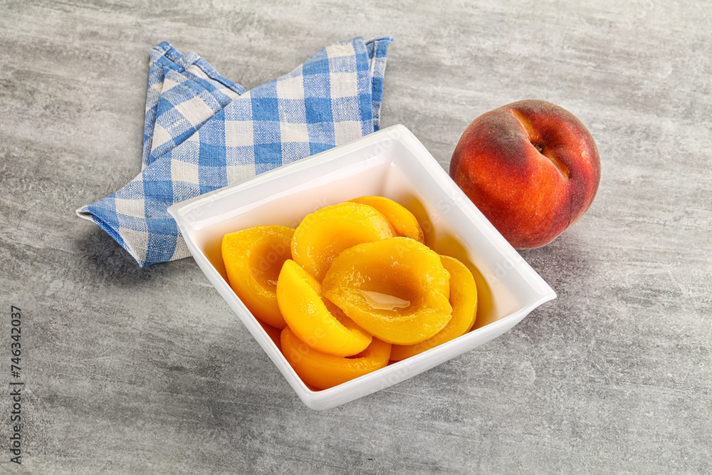 Ripe sweet and juicy canned peach Ripe sweet and juicy canned peach