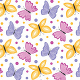 Seamless polka dot pattern with cute butterflies.