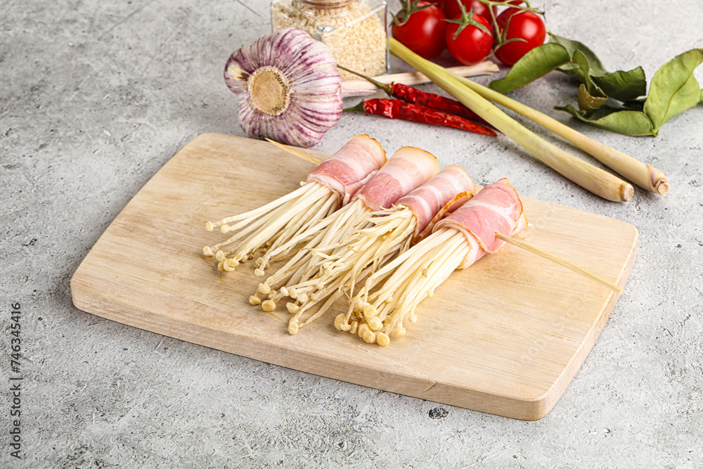 Raw Enoki mushroom with bacon Raw Enoki mushroom with bacon