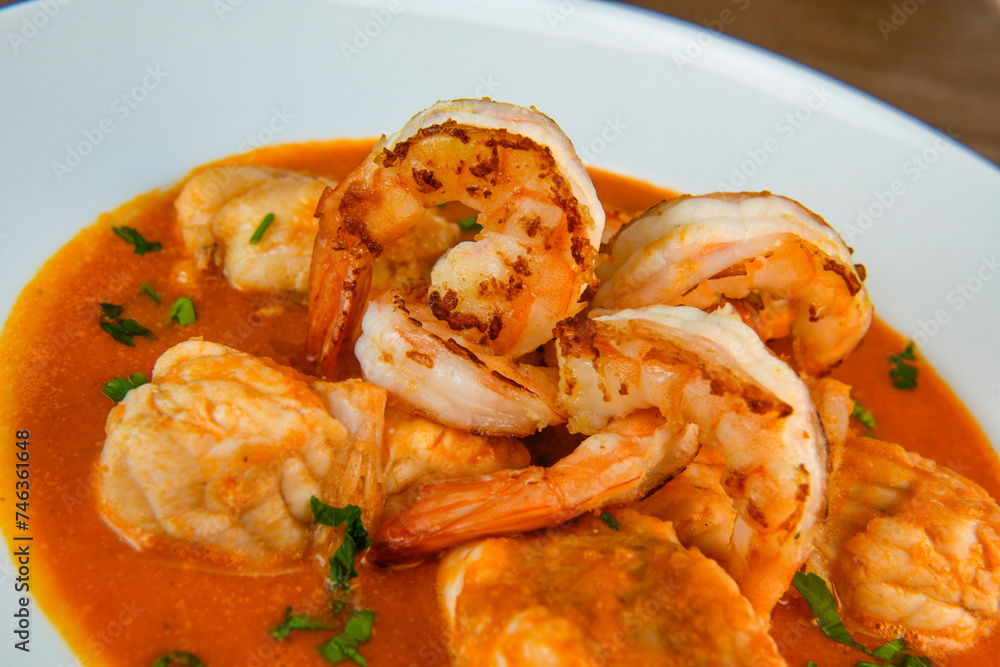 Recipe for Armorican-style monkfish tail, prawns, flambees with cognac, High quality photo Recipe for Armorican-style monkfish tail, prawns, flambees with cognac, High quality photo