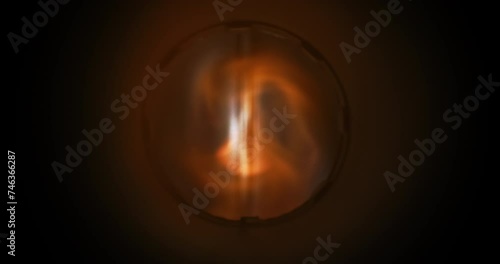 Vortex of fire forming inside machine tubing. Radiating heat waves photo