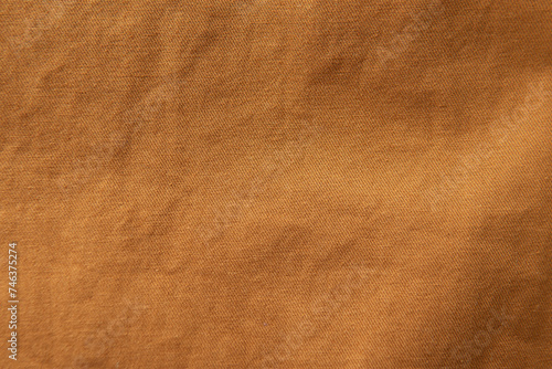 Brown Knit polyester fabric or Polyethylene terephthalate cloth material texture background photo