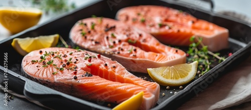 Delicious grilled salmon steaks with zesty lemon and aromatic herbs for a gourmet seafood meal