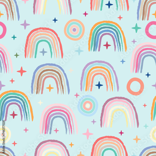 Rainbows, stars, circles, pattern, seamless pattern, multi-colored rainbows, light blue background, print, paper, children's wallpaper, textile. 
