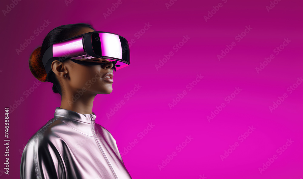 A woman wearing virtual reality headset glasses on a purple background. Concept of technology, augmented reality, science, engineering. Copy space for text, advertising, message, logo A woman wearing virtual reality headset glasses on a purple background. Concept of technology, augmented reality, science, engineering. Copy space for text, advertising, message, logo