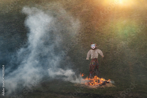 burning effigy at the traditional Maslenitsa celebration photo