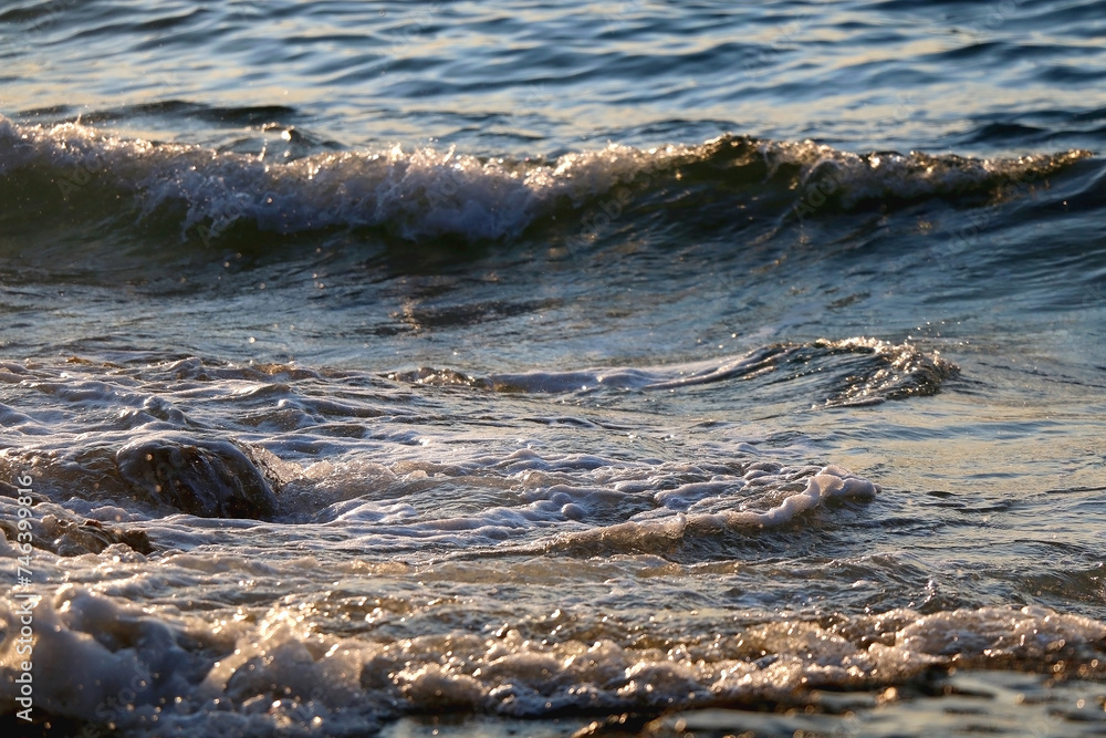 Bright blue sea surface, close-up. Bright blue sea surface, close-up.