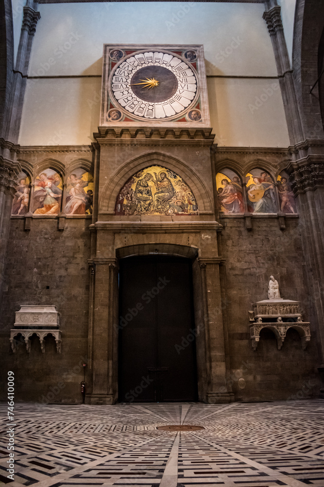 Lowlight interior of Santa Maria del Fiore cathedral with counterclockwise and decorative paintings, Florence ITALY