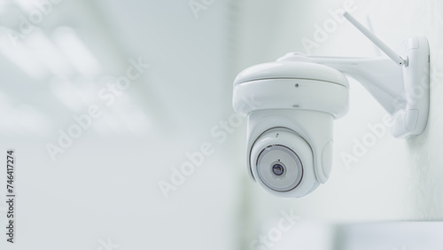 Obraz na płótnie Cctv Security Camera Installed in white room or laboratory. Can be used in technology background or security work. w salonie