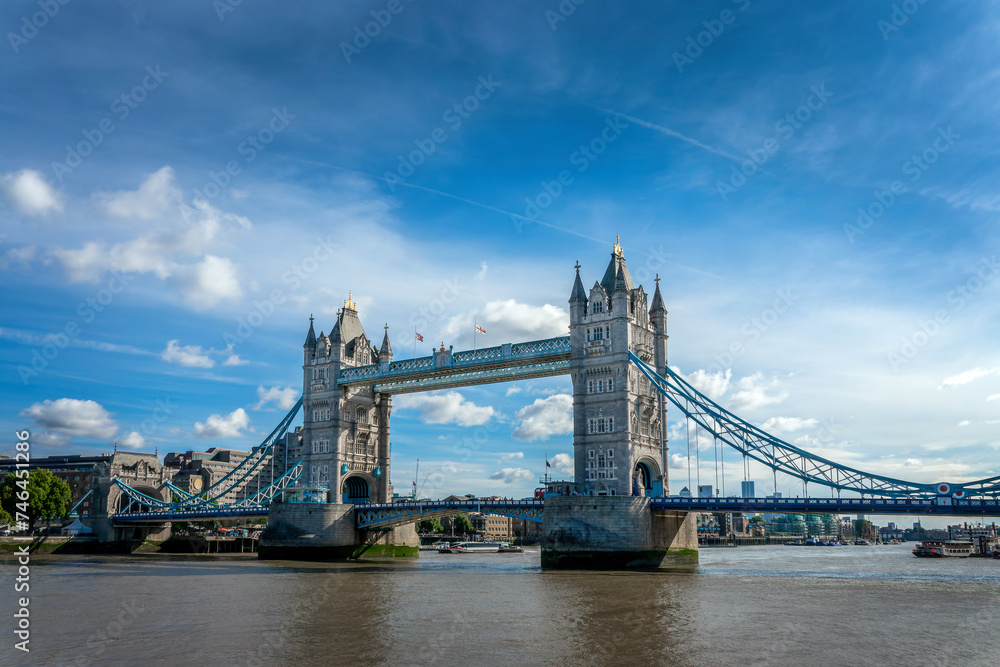 The Tower Bridge and the river Thames on a sunny day in London, UK