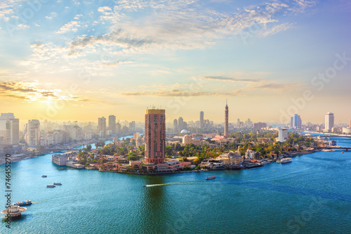 Gezira island in the Nile river at sunset, exclusive aerial view of Cairo, Egypt © AlexAnton
