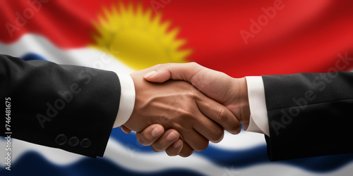 Businessman, diplomat in suits clasp hands for handshake over Kiribati flag, agree on united success in trade, diplomacy, cooperation, negotiation, support, teamwork in commerce, gesture of greeting